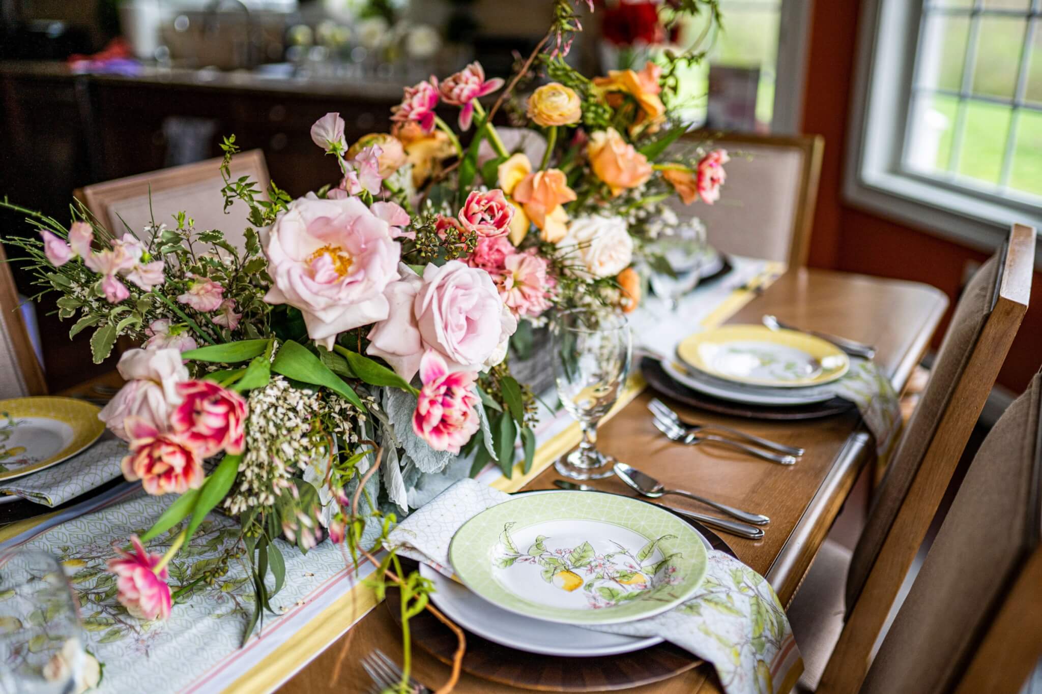 beautiful pink and peach colored flowers with spring pastel plates