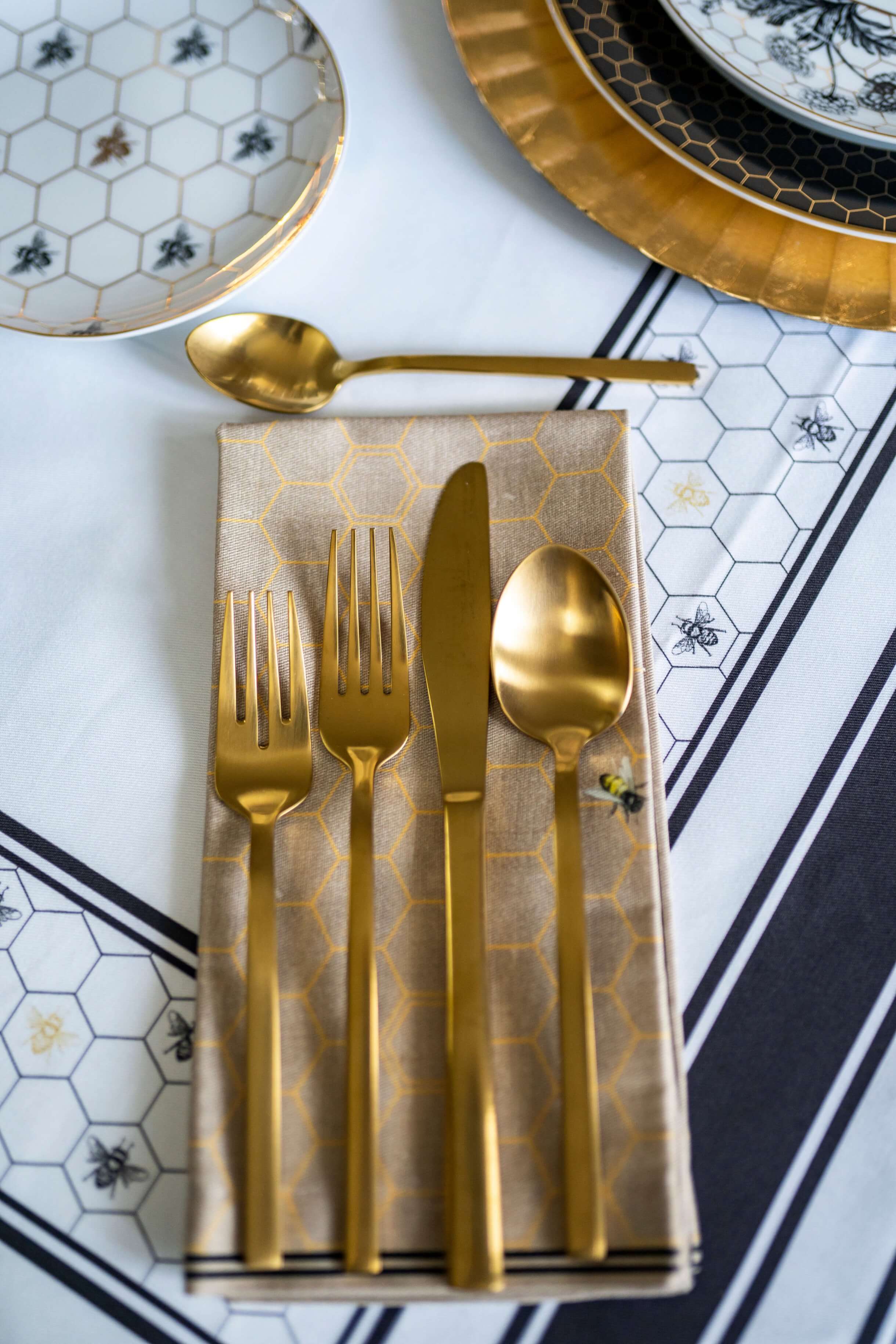Gold flatware on flax napkin