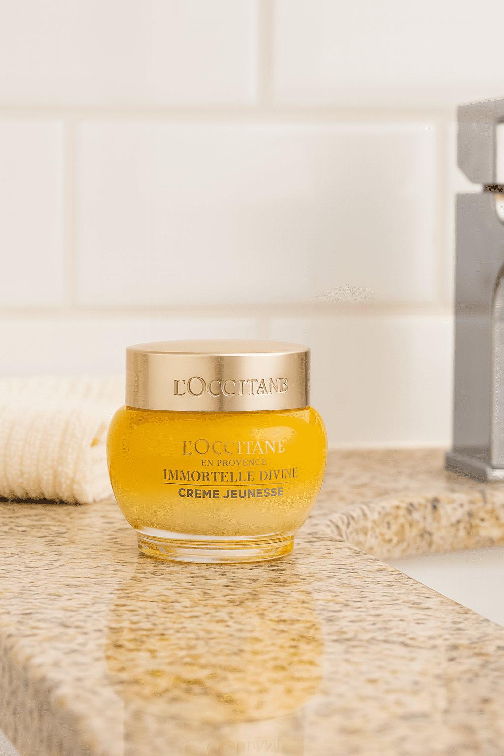 L’OCCITANE Immortelle Divine Cream on bathroom counter